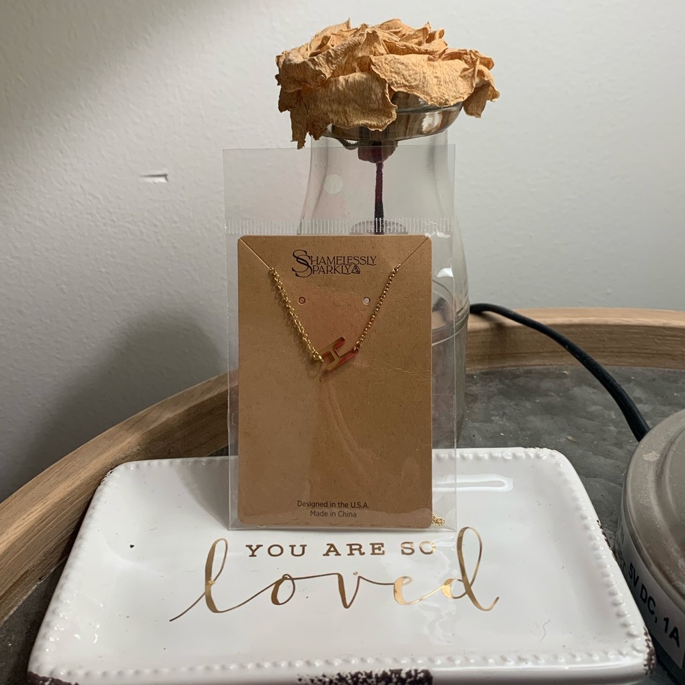 Shamelessly sparkly gold “H” necklace